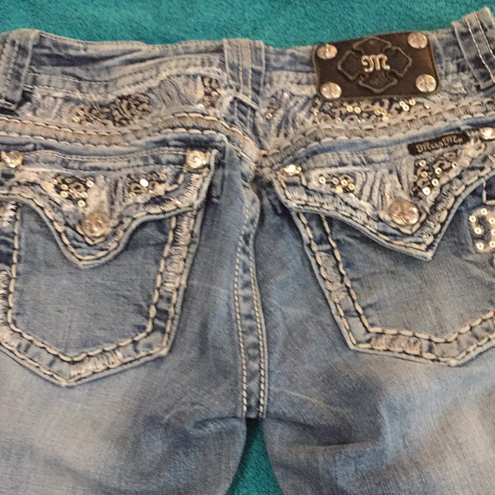 Miss Me jeans.  27 inch waist, inseam 31